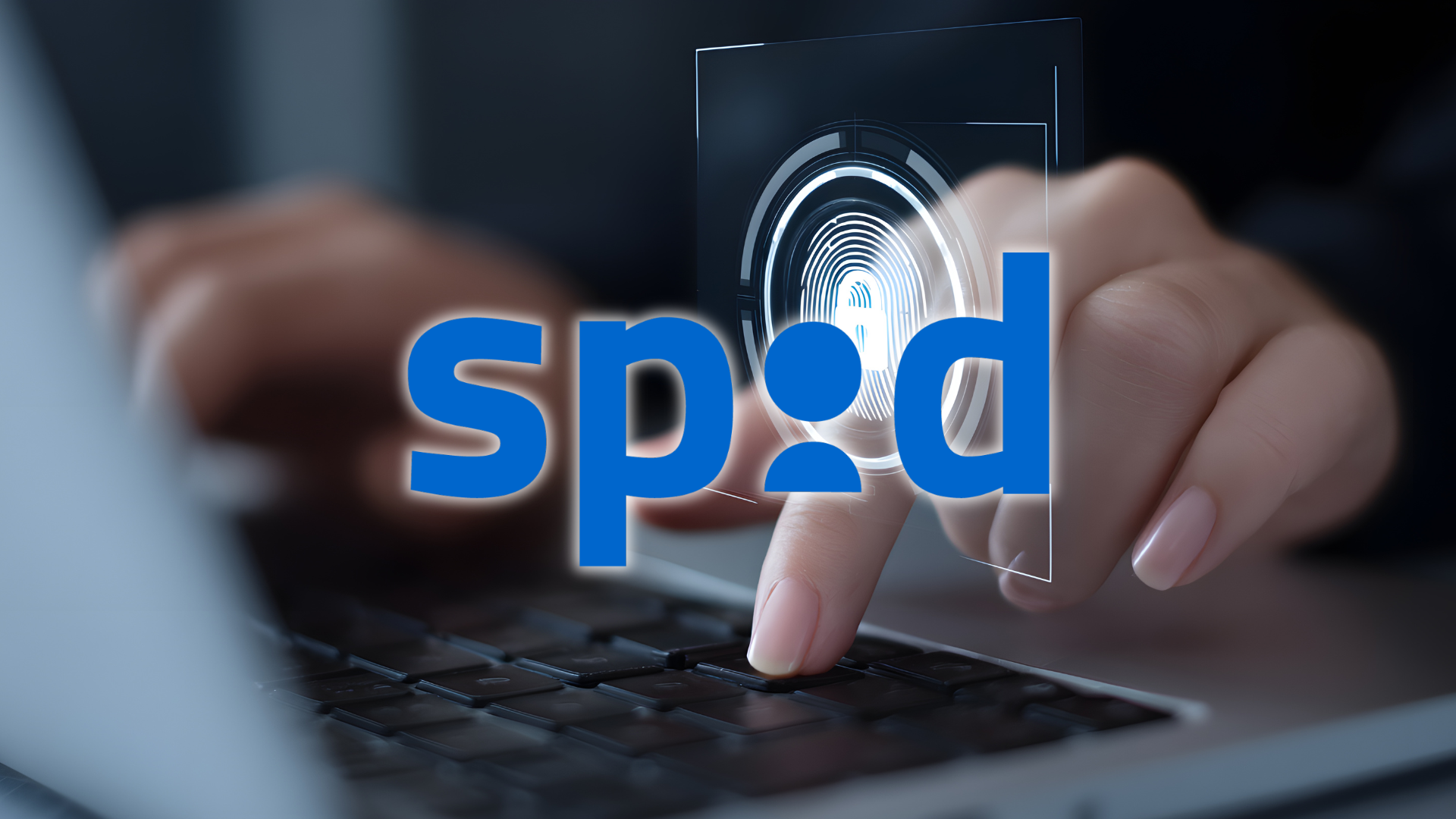 Immagine generica di una persona che digita su un computer. In primo piano c'è il logo SPID.