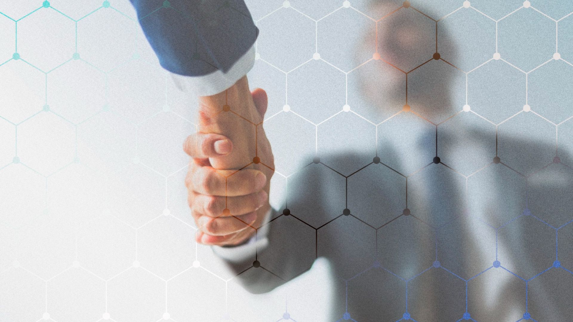 Stretta di mani fra due persone